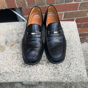Classic Black Leather Loafers with Gold Accent